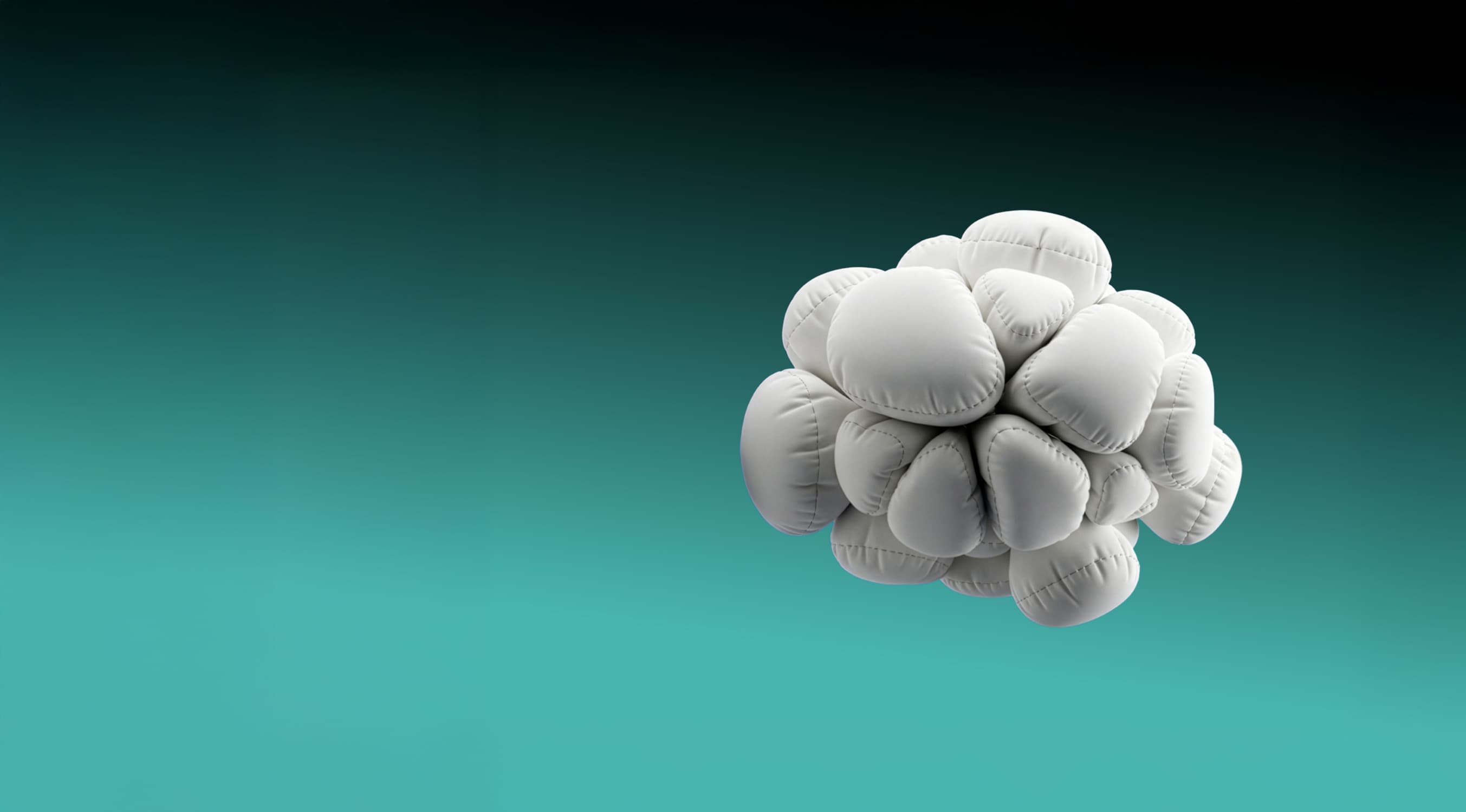 Cluster of white airbag-like cushions against a teal gradient background.